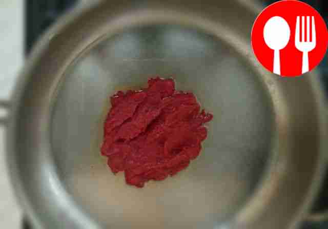 In a heated frying pan, sauté tomato paste and...