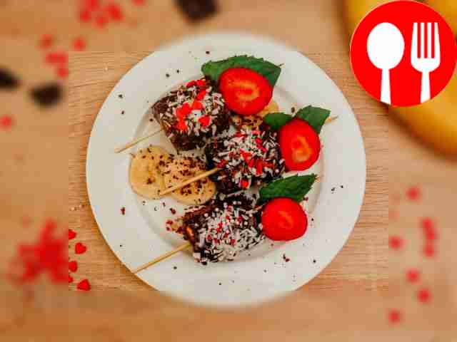 Chocolate covered bananas with sprinkles
