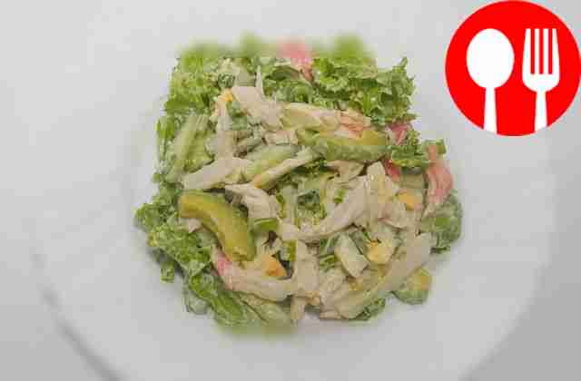 Squid and crab meat salad with avocado and cucumber