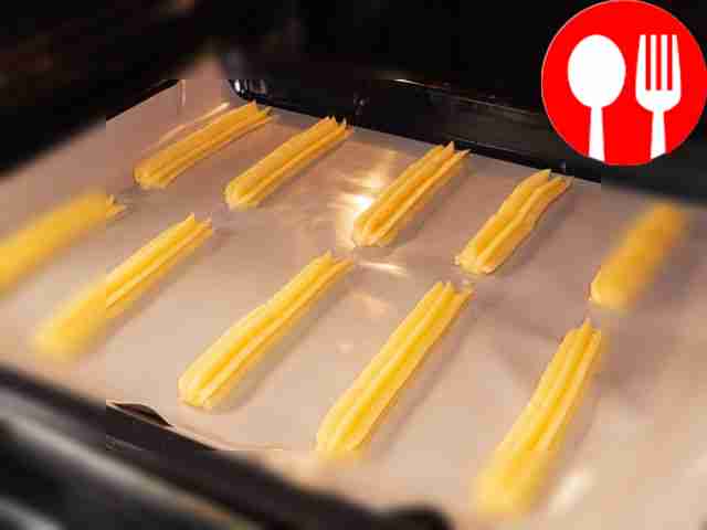 Make homemade eclairs. Place the dough into a...