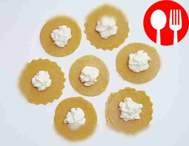 Roll out the dough thinly into one large...