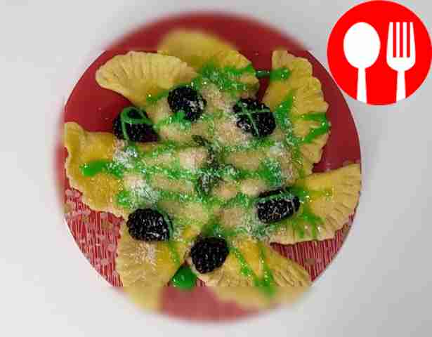 Place ravioli on a plate. Top them with sauce....