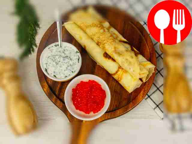 Pancakes with sour cream and caviar