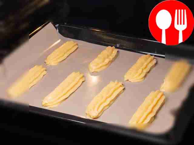 Form and bake the eclairs. Line a baking sheet...