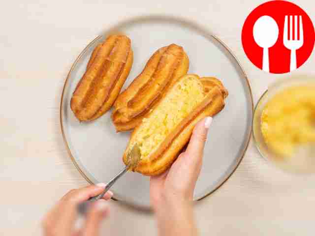 Fill the eclairs with apple cream. Cut each...