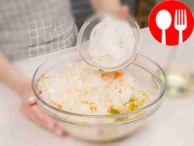 Assemble the salad. Combine cabbage, cucumbers...