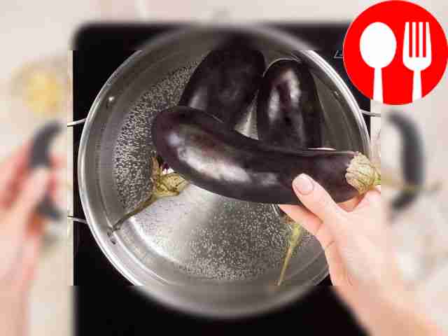 Boil the eggplants. Place a pan of water on...