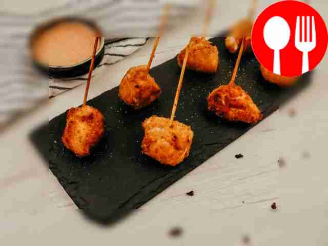 Place the canapés on a plate.