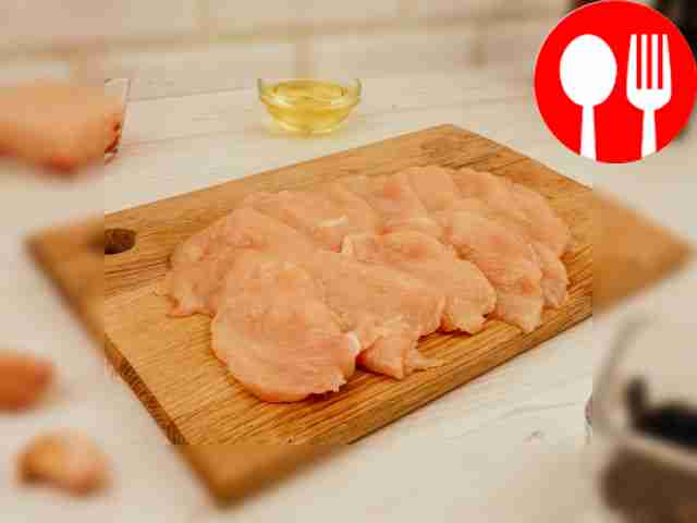 Slice the chicken breast into thin strips.