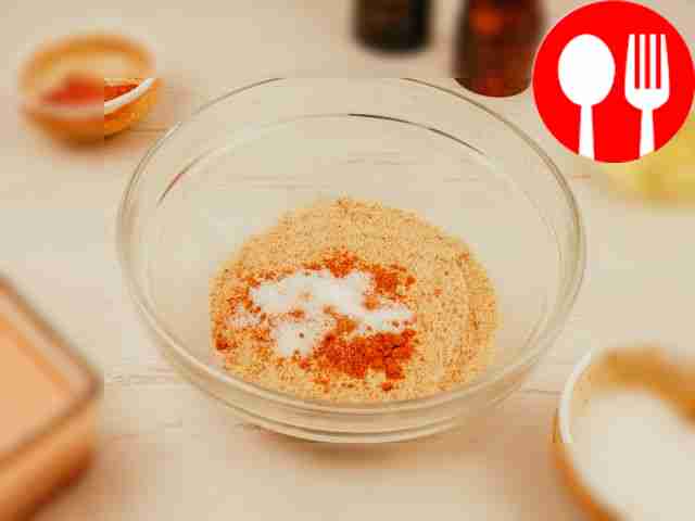 Mix bread crumbs with paprika and add salt.