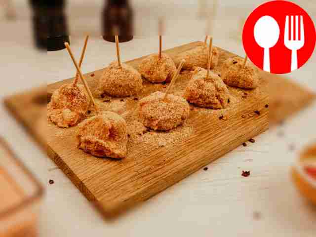 Carefully coat the canapés in the mixture.