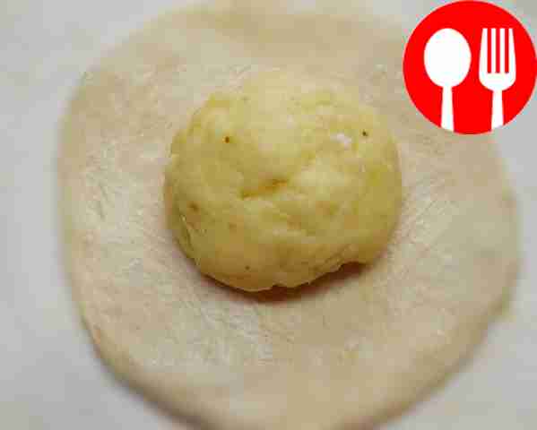 Divide the dough into 4 parts. Roll out each...