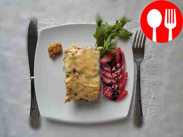 Serve the casserole in neat portions. Place a...