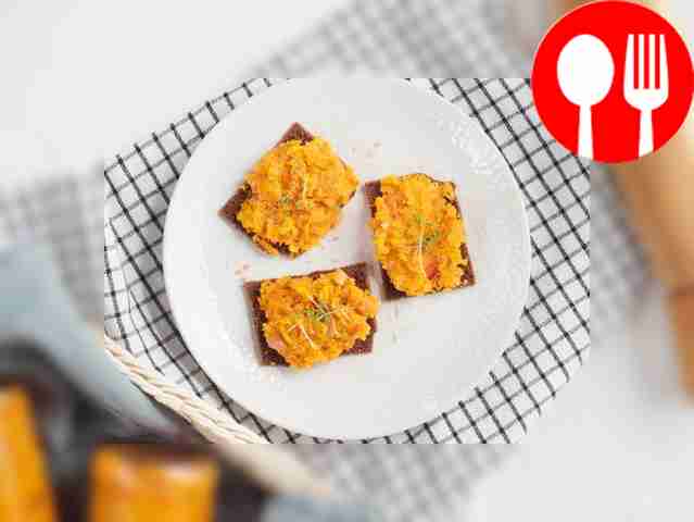 Serve carrot caviar on rye bread. Place a...
