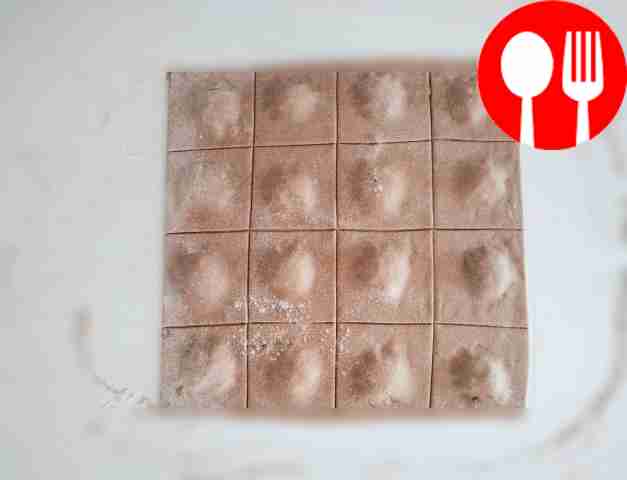 Roll out the dough into 2 thin layers. Place...