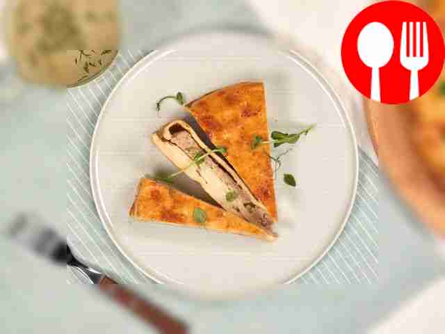 Cut the pie into portions and serve with hot...