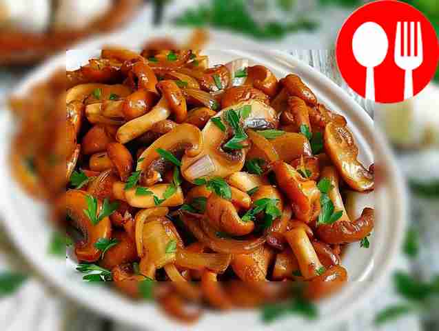 Appetizing fried chanterelles with onions
