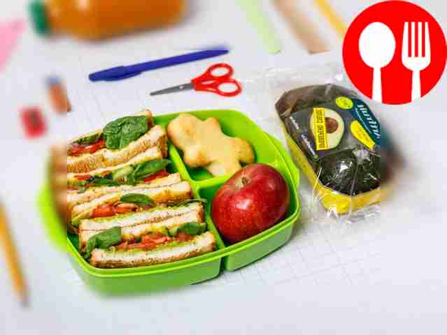 Sandwich with avocado, cucumber and tomato