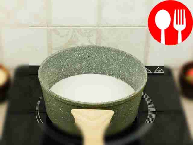 Pour the milk into a small ladle or saucepan...