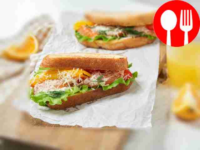 Place the salmon batard on a thick wooden...