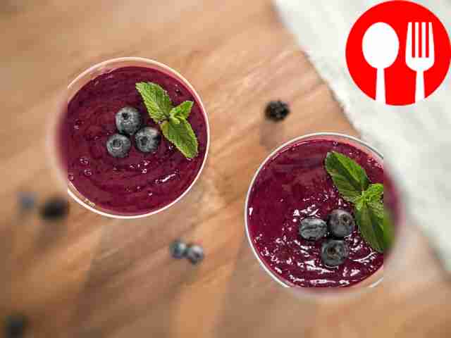 Garnish with berries and mint. Serve the...