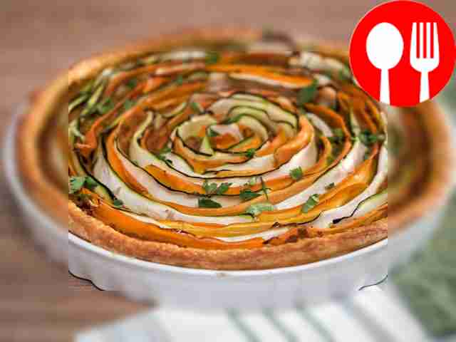 Serve the pie chilled, garnished with herbs.