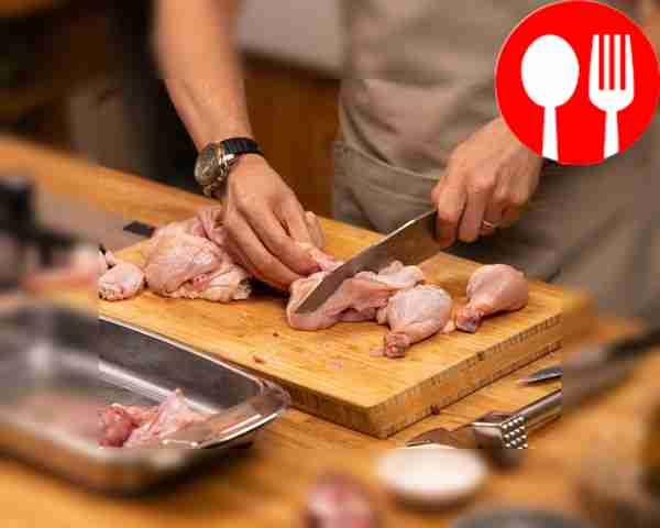 Cut the chicken into pieces and dry it with a...