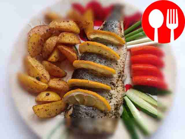 Herring baked with onion and lemon