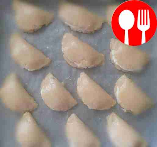 Line a baking sheet with parchment paper and...