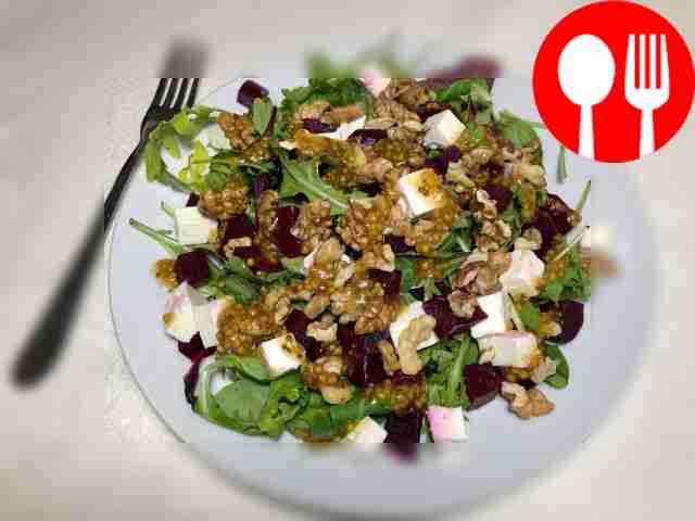 Serve the salad in portions on white plates;...
