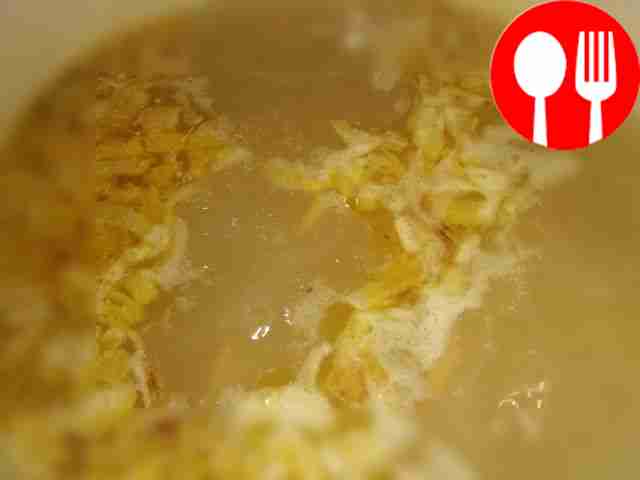 Cook the vegetables in the broth until half...