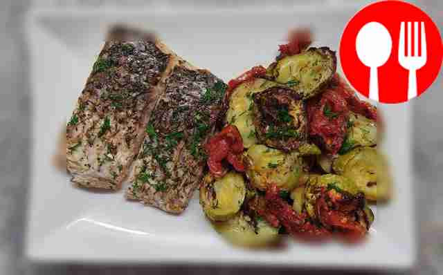Carp baked with vegetables