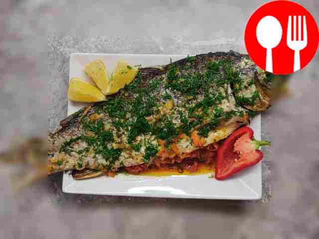 Tender carp baked with mayonnaise