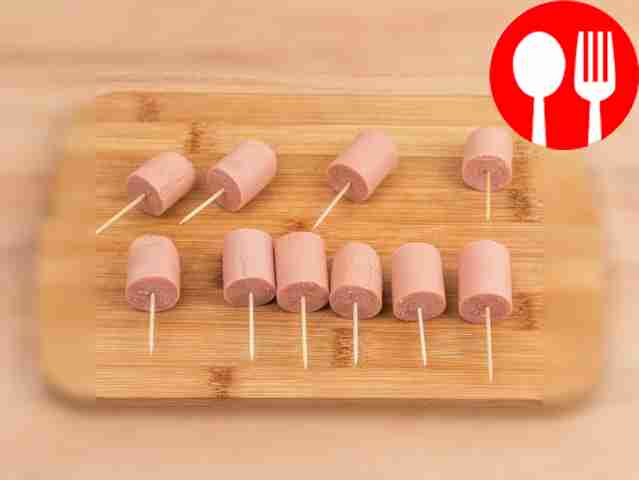 Cut the sausages into portions. Thread the...