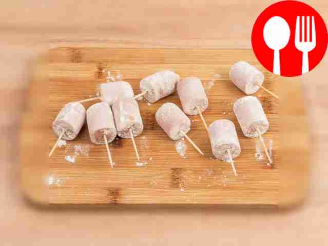 Dredge sausages in flour.