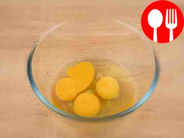 Break three eggs into a deep bowl and whisk.