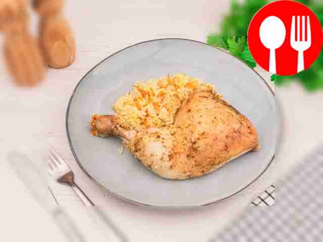 Place chicken legs with rice and carrots on a...
