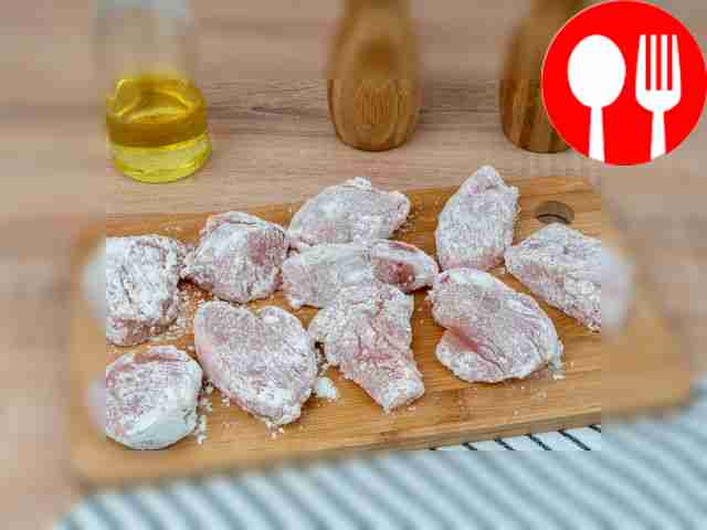 Dredge each piece of chicken in flour.