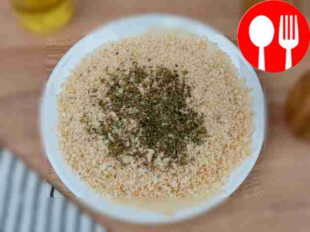 Mix breadcrumbs and dried herbs.