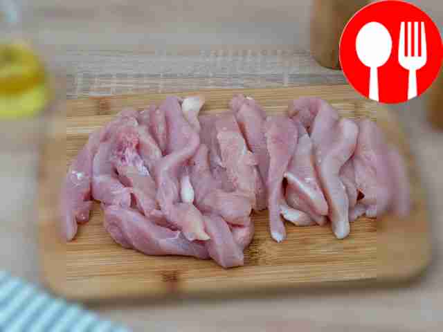 Cut the chicken breast into long, equal-sized pieces.