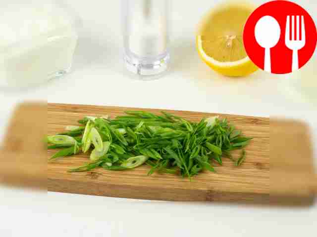 Slice the green onions diagonally into thin pieces.