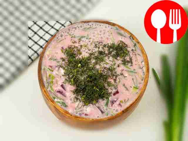 Add sour cream and chopped dill to beetroot soup. Stir.