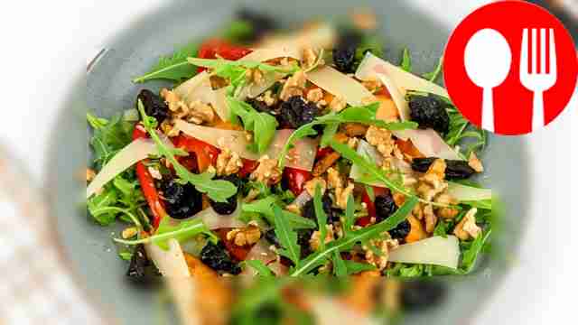 Salad with chicken, prunes and walnuts