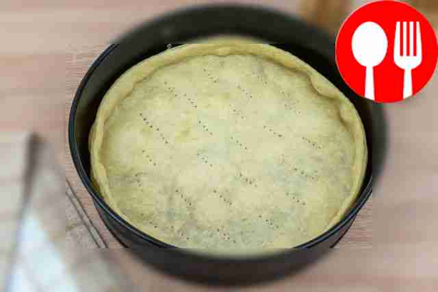 Place the dough in a removable pan, greased...