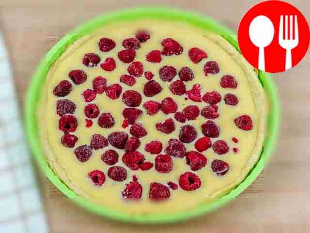 Pour sour cream filling into the prepared...