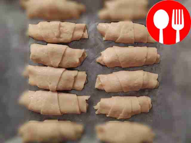 Place all bagels on a baking sheet lined with...