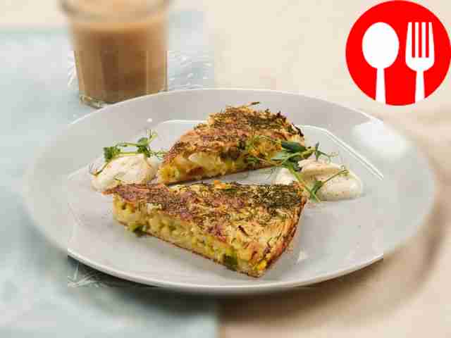 Jellied pie with cabbage, onion and egg