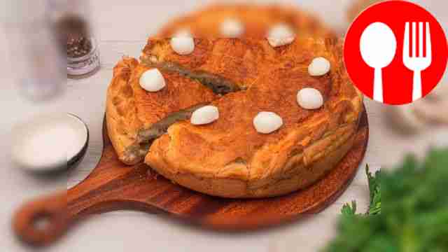 Pie with potatoes and mushrooms on yeast dough