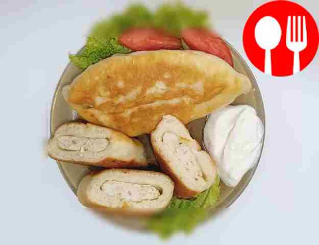 Place the belyashi on lettuce leaves, or place...