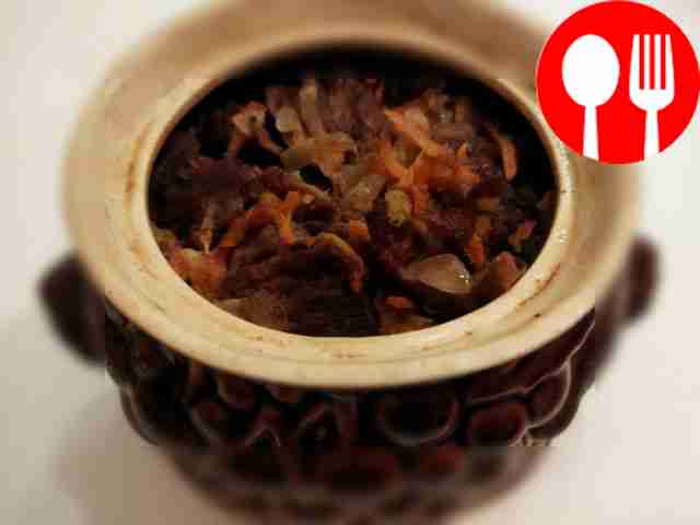 Pea porridge with pork in a pot